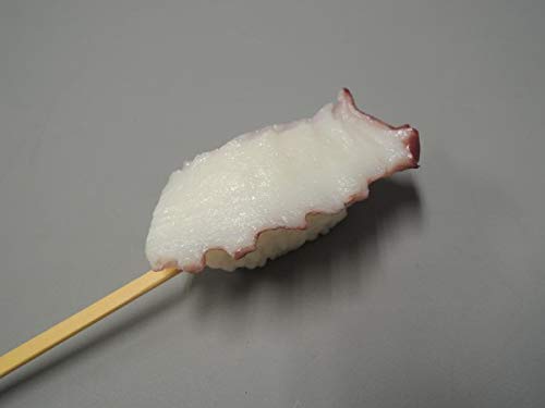Проба на ястия, приготвени от японския майстор-ушастиком от октопод grip